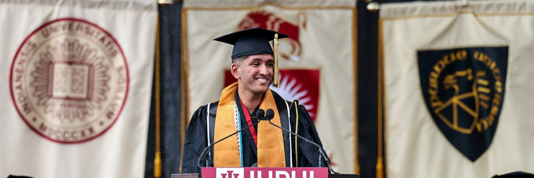 A graduating senior delivering a speech